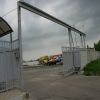 Ворота откатные промышленные, проем ворот 9м, ворота автоматические с электроприводом, ворота подвешены к верхнему рельсу.